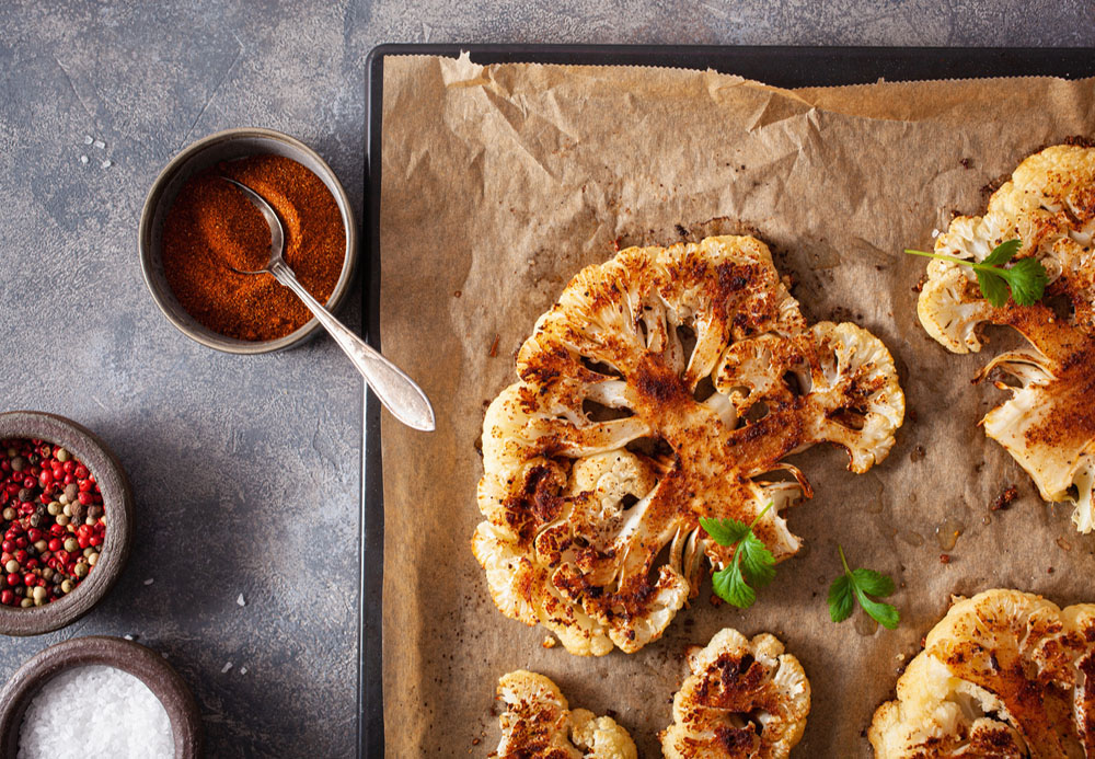 Cauliflower Steaks With Grilled Tomatoes And A Yoghurt Dip